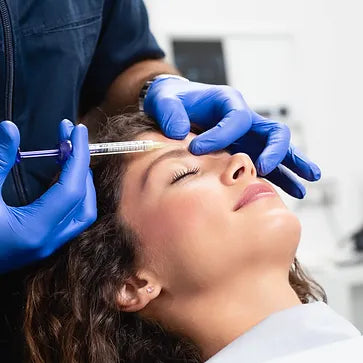 Botox anti-wrinkle treatment on forehead, frown lines, and crow’s feet performed by aesthetics student under medic supervision